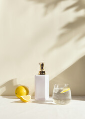 aesthetic white soap jar in a still life with lemons