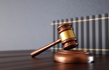 Wooden judge gavel with books on the desk. Law and justice concept