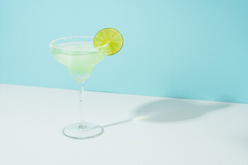 Margarita cocktail. Summer alcohol drink with silver tequila, liqueur, lime juice, sugar syrup,...