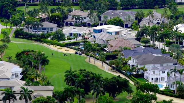 Aerial tour luxury homes Boca Raton Florida USA shot with 7x telephoto lens