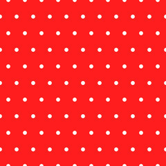 Seamless retro pattern of small white circles on a red background © Yevheniia