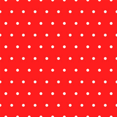 Seamless retro pattern of small white circles on a red background