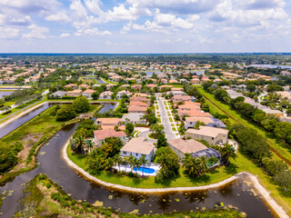 Aerial photo luxury homes in Wellington Florida. Private HOA neighborhoods