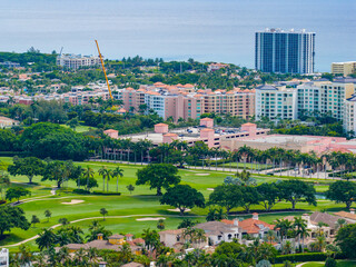 Boca Raton has luxury. Aerial photo. View of homes and golfcourses and shops