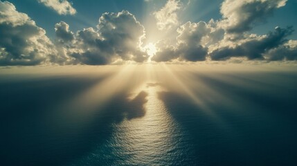 Swirling clouds over the ocean aerial photography dramatic landscape serene environment sky view nature concept
