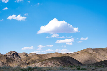 Steppe landscape in the Ili River valley near Almaty, with a beautiful sky in the clouds