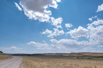 Steppe landscape in the Ili River valley near Almaty, with a beautiful sky in the clouds