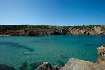 view of the sea at Cala Domestica beach and promontory, along the west coast of Sardinia, Buggerru,...