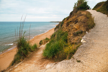 Scenic Coastal Path Overlooking Sandy Beach