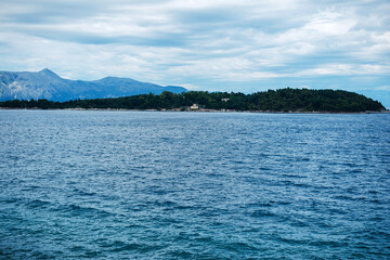 Serene Seascape with Distant Island