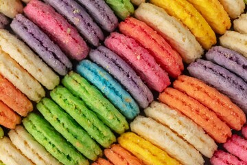 stack of colorful macarons close up background 
