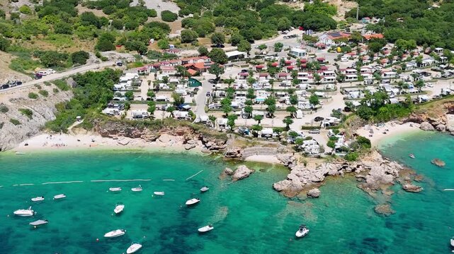 Campsite at Campig Skrila, Krk Island, Stara Baska Croatia, Aerial View of the Mountains and Coast With Boats, Beaches and Adriatic Sea.  The Seaside Rv Campmobiles on a Summer Beautiful Coastline