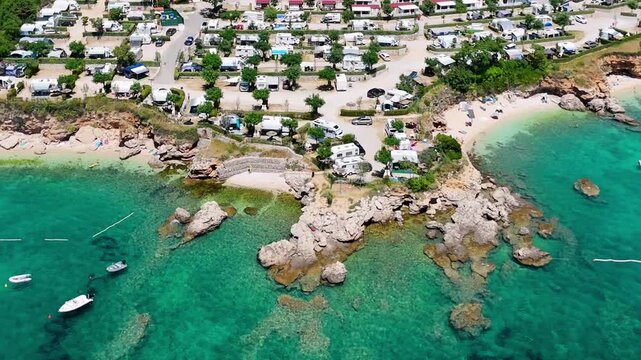 Campsite at Campig Skrila, Krk Island, Stara Baska Croatia, Aerial View of the Mountains and Coast With Boats, Beaches and Adriatic Sea.  The Seaside Rv Campmobiles on a Summer Beautiful Coastline