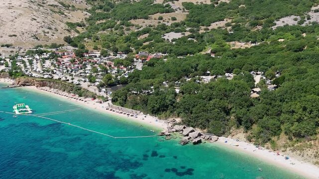 Campsite at Campig Skrila, Krk Island, Stara Baska Croatia, Aerial View of the Mountains and Coast With Boats, Beaches and Adriatic Sea.  The Seaside Rv Campmobiles on a Summer Beautiful Coastline