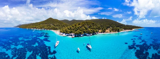 Gardinen Greece sailing Greek travel. Aerial panoramic drone view of  Kastani - most beautiful beach in Skopelos island, Sporades.  drone view of crystal turquoise sea and sail boat © Freesurf