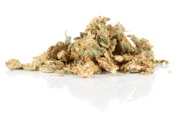 Street drug: pressed marijuana buds isolated on white