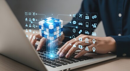 Person typing on laptop with holographic cube and digital icons floating above keyboard