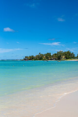 Beautiful landscape of Tropical Paradise - Belle Mare Beach stretches toward the Indian Ocean. Mauritius Island. Travel and vacation concept. 