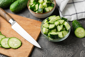 Cucumber on wooden background. Slice of cucumber on background. Fresh organic green cucumbers...