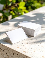 Business Card Stack on Terrazzo Surface with Natural Light