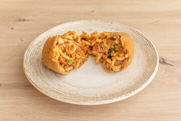 Arancini, those irresistible stuffed fried rice balls, are much more than a simple appetizer or street food; they are a culinary emblem of Sicilian gastronomy