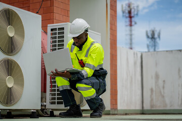 Engineers is checking the air conditioning cooling system of a major building or industrial...