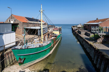 mussel cutter at low tide in Yerseke, Netherlands