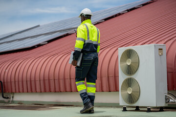 Engineers is checking the air conditioning cooling system of a major building or industrial...