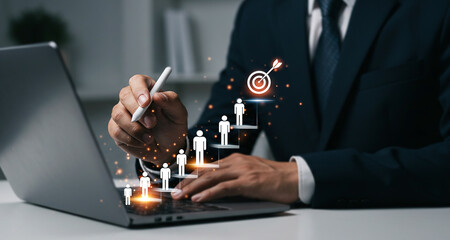 Business man using laptop for target achievement and success