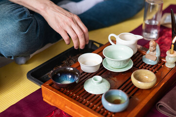 Tea ceremony at home. Tea drinking tradition. Buddhism