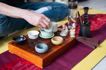 Tea ceremony at home. Tea drinking tradition. Buddhism
