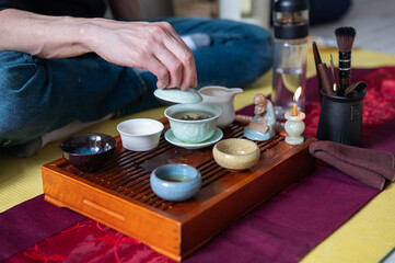 Tea ceremony at home. Tea drinking tradition. Buddhism