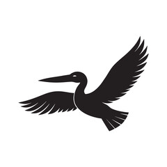 Obraz premium silhouette pelican flying over waves