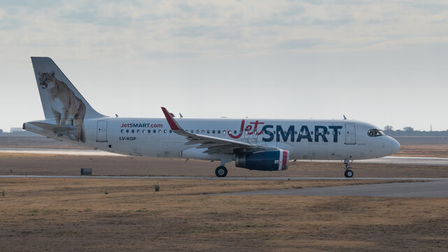 right profile view of an Airbus A320 used by Chilean airline JetSmart entering the runway at Cordoba airport, Argentina, on July 8, 2025.