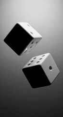 Two white dice with black dots appear to be floating or falling against a gray gradient background.