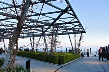 THE GARDEN AT 120, LONDON, UNITED KINGDOM - MARCH 24TH, 2025: a rooftop oasis of lush greenery,...