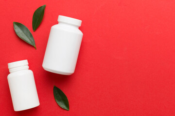 supplement pills with medicine bottle health care and medical top view. Vitamin tablets. Top view...