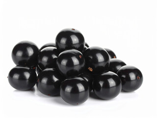 Fresh blackcurrant berries isolated on white background. Ripe black currant fruit, natural antioxidant and vitamin C source