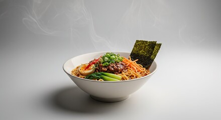 A bowl of ramen with toppings on a white background