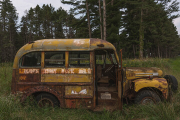 old bus in the middle of the woods 