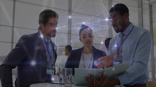 Business team opening green folder reviewing charts with animated network overlay