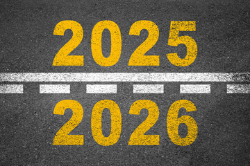 New year 2026 or straight forward concept. Text 2025, 2026, 2027, 2028 written on the road in the...