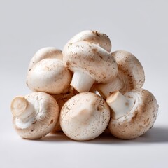 A pile of fresh, whole white mushrooms button, isolated on a pure white background. Vegetable, ingredient.