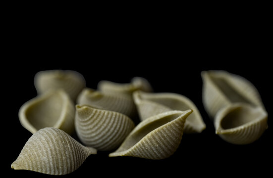 colored pasta shells - Powered by Adobe