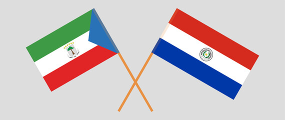 Crossed flags of Equatorial Guinea and Republic of Paraguay. Official colors. Correct proportion. Vector illustration