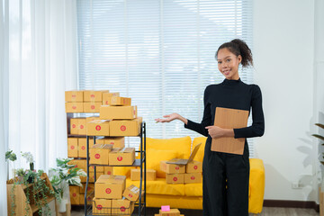 Pretty African American sme business woman working Custom Ecommerce Packaging leading supplier of...
