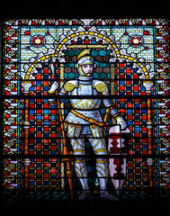A stained glass knight depicted in vivid detail inside Castle de Haar in the Netherlands, the...