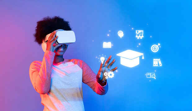 A student enthusiastically engaging in virtual reality as part of an innovative online learning experience, highlighting the emerging technologies in education. XDMCP