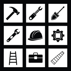 Obraz premium Black vector silhouettes of construction tools and safety equipment hammer wrench