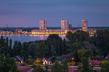 Apartment buildings at lake ¨Zevenhuizerplas¨ in district Nesselande, city of Rotterdam, Netherlands